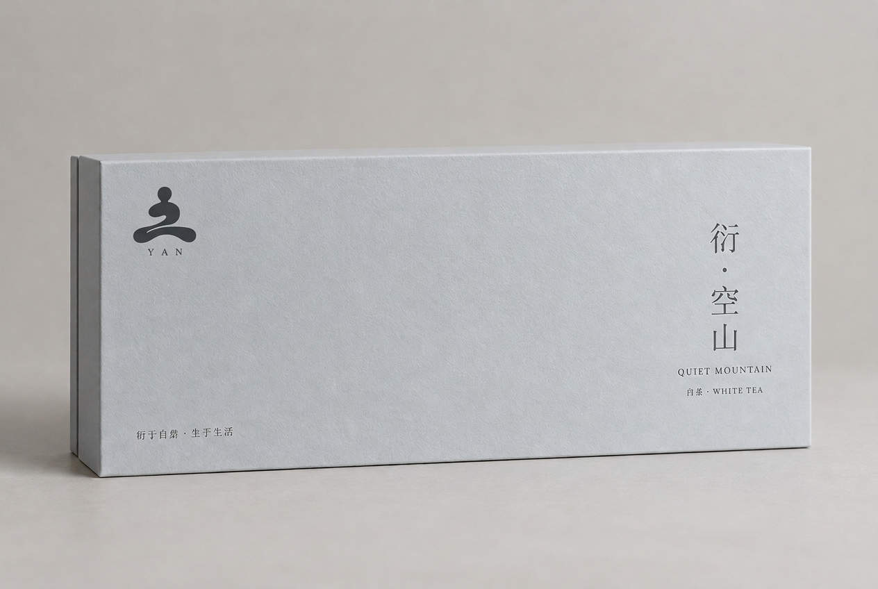 Concept render of the misty moon-white Quiet Mountain white tea gift box with an ivory YAN emblem and vertical title.